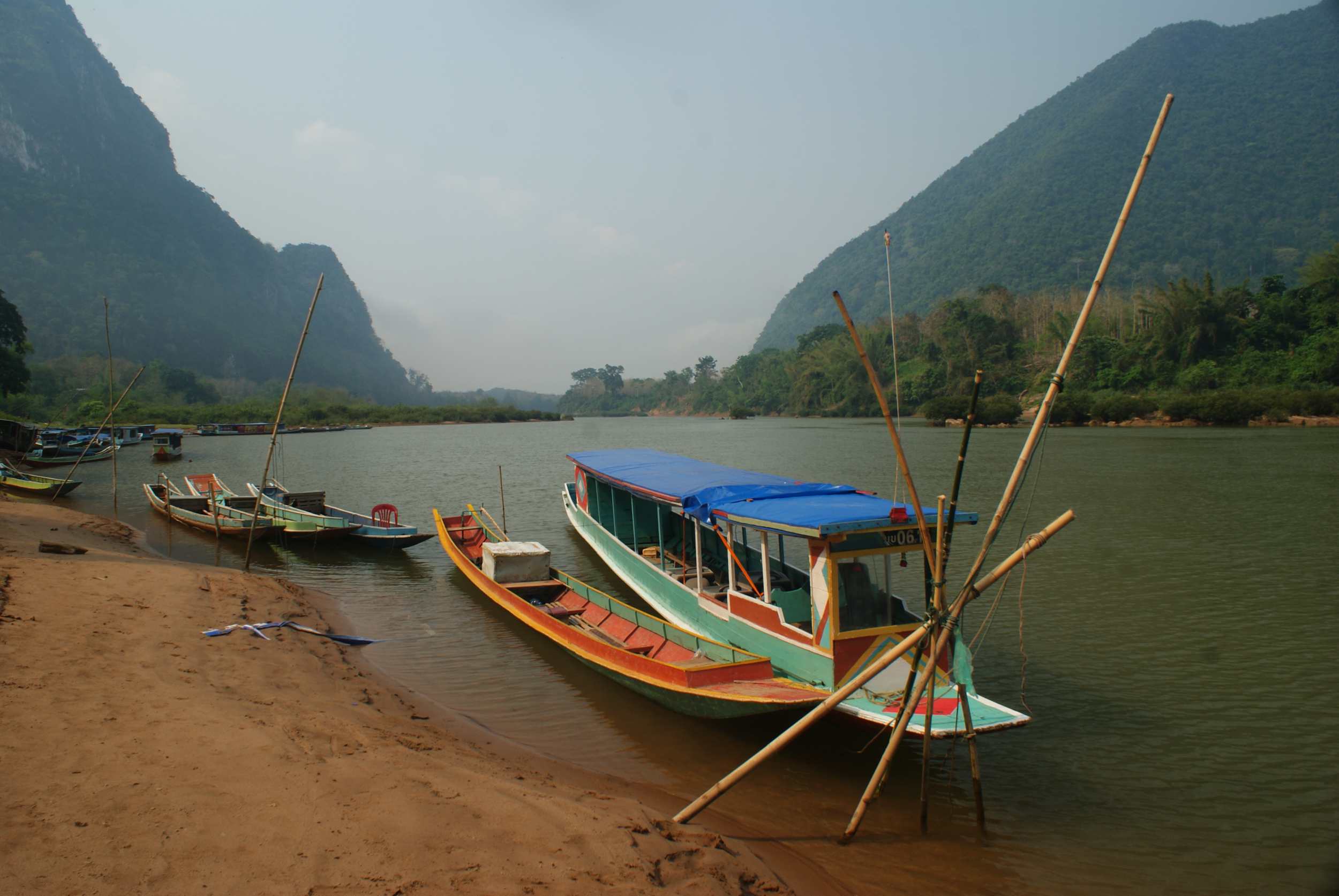 Boats transporting people and good up and down the river