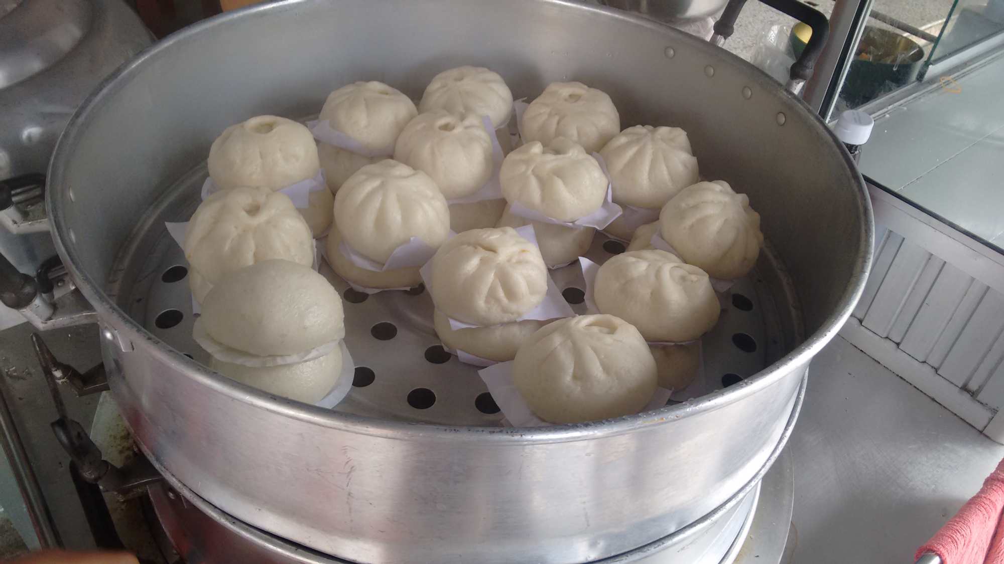 Baozi or bao, filled with meat or taro